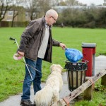 Malcolm Walls with his dog poppy out litter picking. Malcolm has picked up more than 600 bags of rubbish in the last three years to keep part of Crawley litter-free wants more people to take responsibility for the litter they drop. Crawly, West Sussex. See SWNS story SWBIN; A super-citizen has taken litter picking to extreme lengths and has already collected almost 300 bags of rubbish this year. Father-of-two Malcolm Walls, 56, picks up everything from dirty nappies to empty takeaway containers and has on occasion even spotted used needles. The retiree walks the same 20-minute route near his home every single day since 2012 when he became overwhelmingly frustrated with the amount of litter discarded in the streets. Malcolm, from Crawley, West Sussex, said: "It reached the point where my frustration levels at thinking 'how could someone walk away and leave litter laying on the floor' reached a tipping point. "I happened to have a carrier bag with me when I saw a pile of litter on the floor by a bench and I've been picking up rubbish ever since. credit SWNS