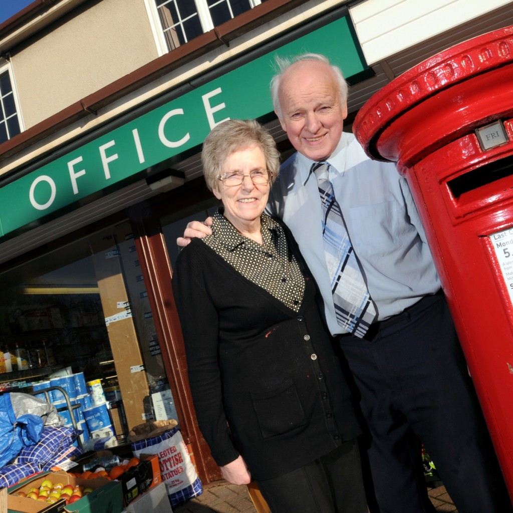 Joyce and Don Olivant outside Cherry Tree Hill Post Office, Derby.  See Newsteam story NTIPOST; A couple believed to be Britain's longest serving postmasters have finally retired - after almost 60 YEARS. Don and Joyce Olivant, both 71, have decided to bid farewell to their local post office which has been run by their family since 1947. Yesterday (Tue) the couple weighed their final parcels and arranged their last deliveries at Cherry Tree Hill Post Office, in Chaddesden, Derby. They have both provided a first-class service behind the counter of the store since 1978 but Don has been working there since he was 14-years-old. His father Alfred set up the business in 1947 and he became the country's youngest postmaster in 1968 when he took it over at the age of 23.