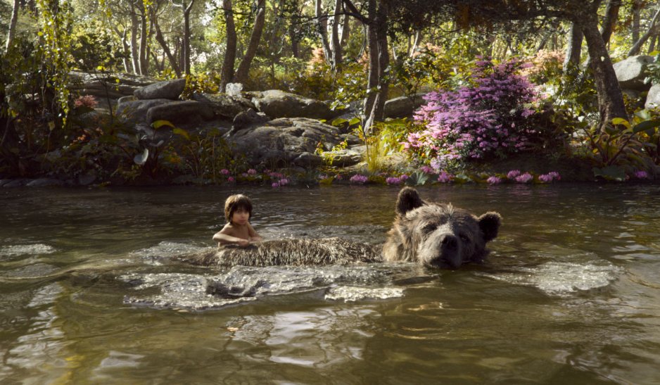 Mowgli and Baloo swimming in river