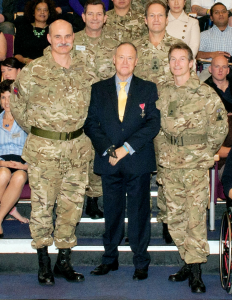 Ray Edwards quad amputee with armed forces personnel