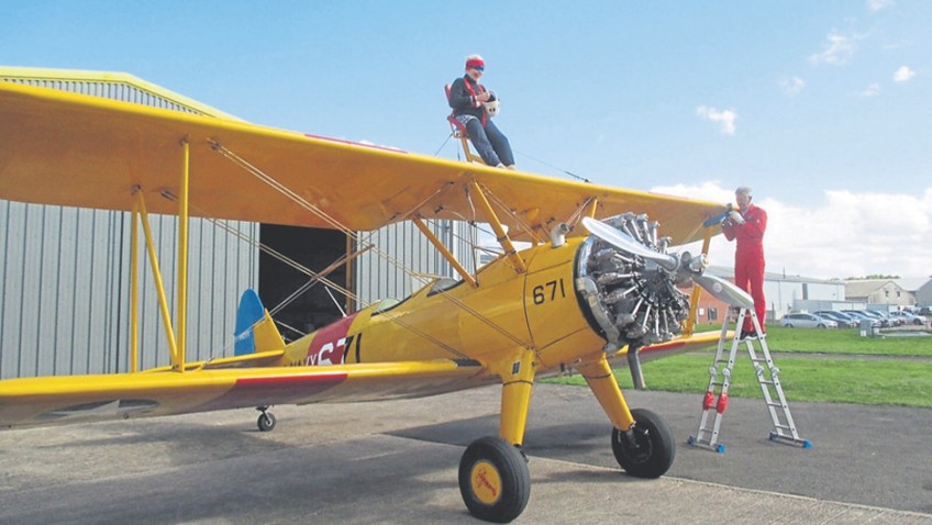 A daring 87-year-old has become Britain’s oldest female wing-walker