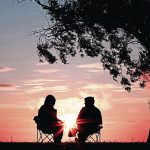 Couple under tree - Relationships - Sunset