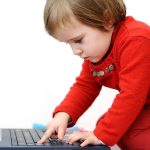 Laptop and child - Grandchild using internet - Free for commercial use No attribution required - Credit Pixabay