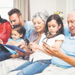 Family using electronic devices