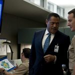 Laurence Fishburne and Bryan Cranston in Contagion - Photo by Claudette Barius - © 2011 Warner Bros. Entertainment Inc. - Credit IMDB