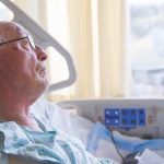Man in hospital bed - Man in care home