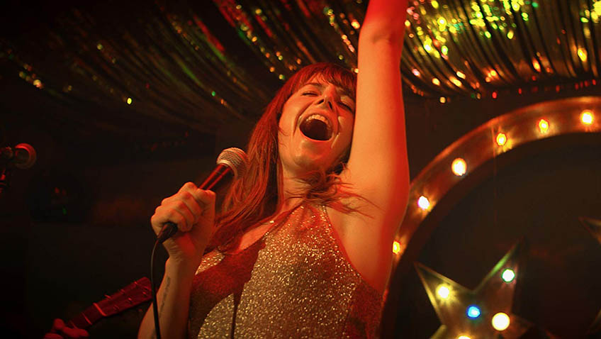 A star is born. There is no lip syncing on Jessie Buckley’s road to the Grand Ole Opry