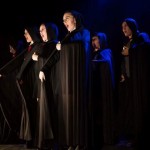 “Beware of Grim!” sing the cast of Grim 