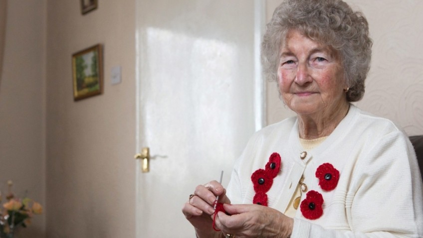 Jean claims creating 20 crochet poppies a day helps battle arthritis
