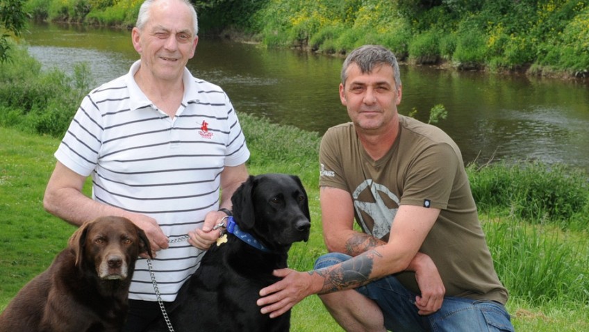 Hero dog saves drowning owner by jumping in river and pulling him to safety