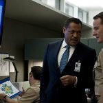 Laurence Fishburne and Bryan Cranston in Contagion - Photo by Claudette Barius - © 2011 Warner Bros. Entertainment Inc. - Credit IMDB
