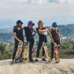 There’s more campervan driving than downhill racing in this female centric longboarding documentary.